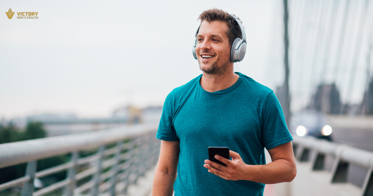 TMG Supplements | Why Biohackers Can't Get Enough | Man walking with headphones