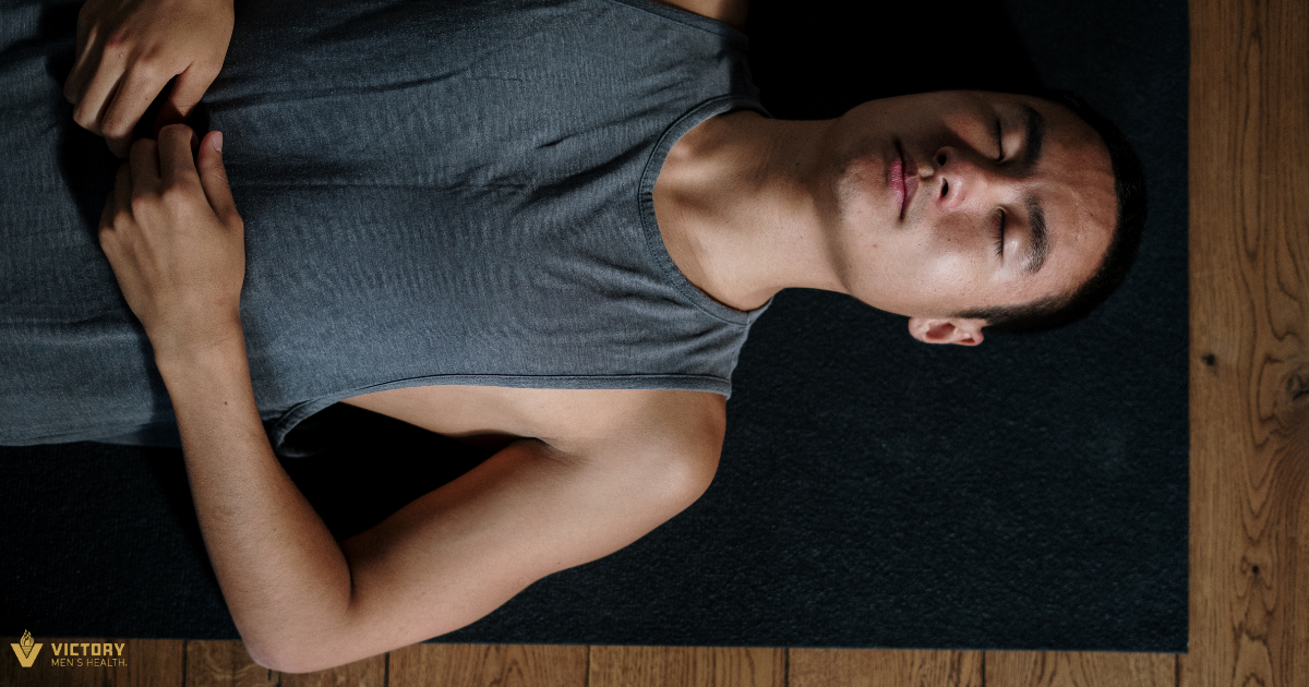 What is PEMF Therapy | Victory Men's Health | Man laying on mat for post workout recovery